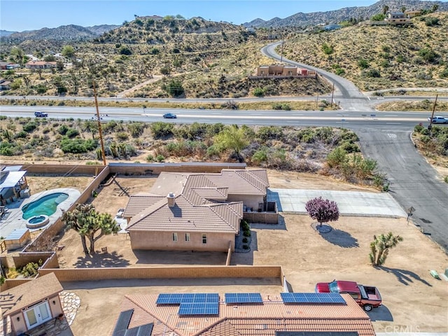 7625 Pinon Dr, Yucca Valley, CA 92284 - aerial view of property and surrounding area with a mountainous background