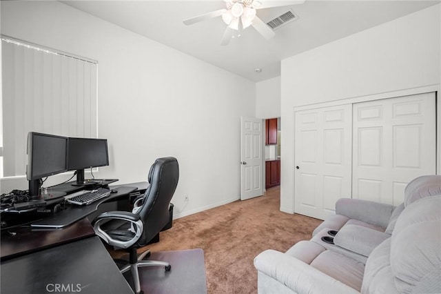 7625 Pinon Dr, Yucca Valley, CA 92284 - office area with a ceiling fan and light colored carpet