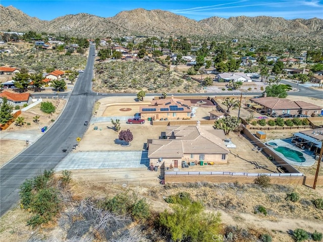 7625 Pinon Dr, Yucca Valley, CA 92284 - aerial view of residential area with mountains