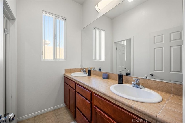 7625 Pinon Dr, Yucca Valley, CA 92284 - bathroom featuring double vanity and tile patterned floors