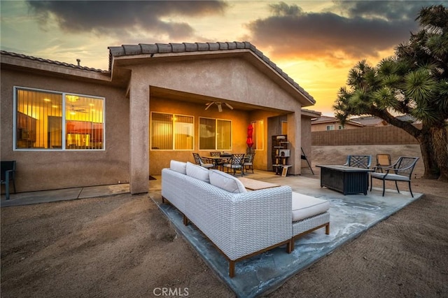7625 Pinon Dr, Yucca Valley, CA 92284 - view of patio / terrace featuring an outdoor living space with a fire pit