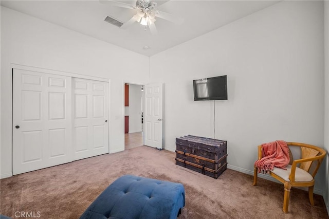 7625 Pinon Dr, Yucca Valley, CA 92284 - living area featuring carpet floors and ceiling fan