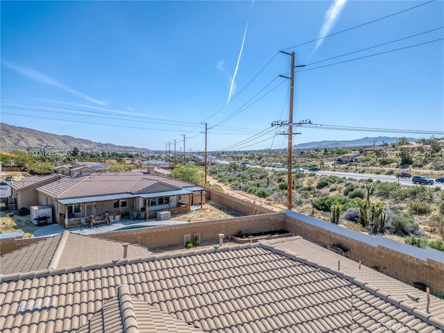 7625 Pinon Dr, Yucca Valley, CA 92284 - fenced backyard with a mountain view and a patio