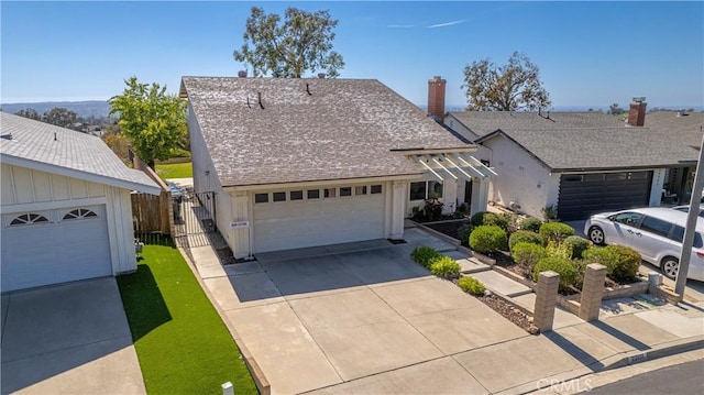 22911 Via Santiago, Mission Viejo, CA 92691 - traditional home with a chimney, a shingled roof, and fence