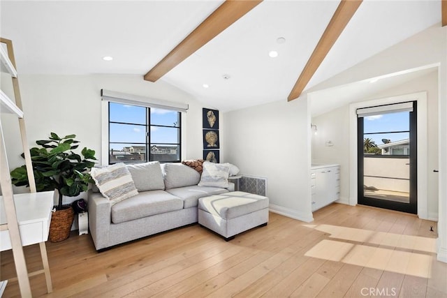 living room featuring vaulted ceiling with beams, light wood-style flooring, baseboards, visible vents, and recessed lighting