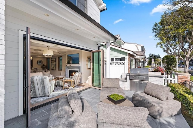 view of patio with an outdoor hangout area and area for grilling
