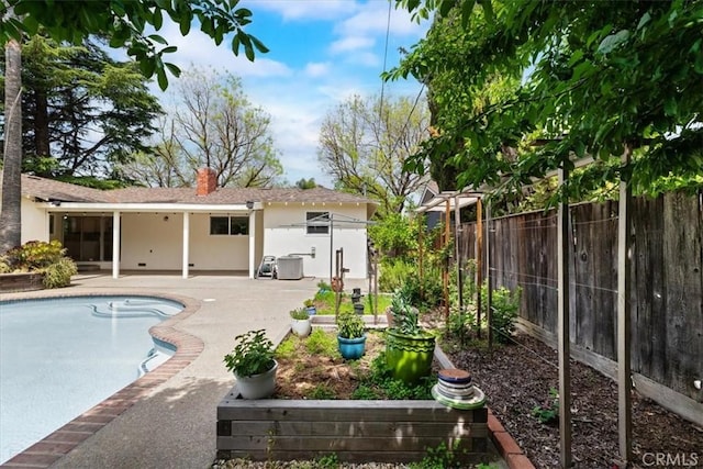 view of pool with a fenced backyard, a fenced in pool, and a patio