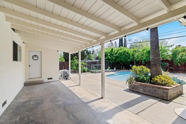 view of patio / terrace featuring a fenced in pool and a fenced backyard