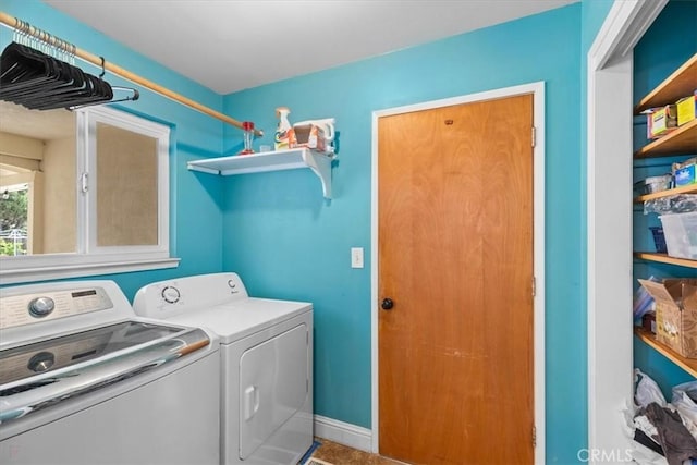 laundry area featuring washer and dryer and laundry area