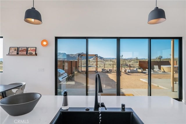 3170 Wesley Rd, Joshua Tree, CA 92252 - kitchen with a sink, decorative light fixtures, and a mountain view