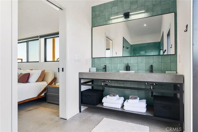 3170 Wesley Rd, Joshua Tree, CA 92252 - full bathroom with decorative backsplash, baseboards, a shower, ensuite bathroom, and speckle patterned floor