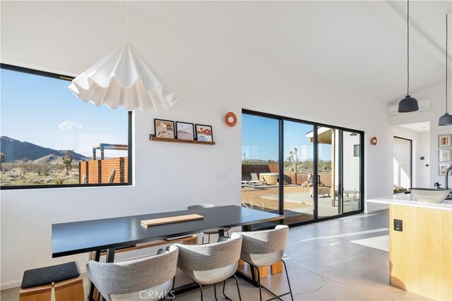 3170 Wesley Rd, Joshua Tree, CA 92252 - dining room featuring concrete floors and a mountain view