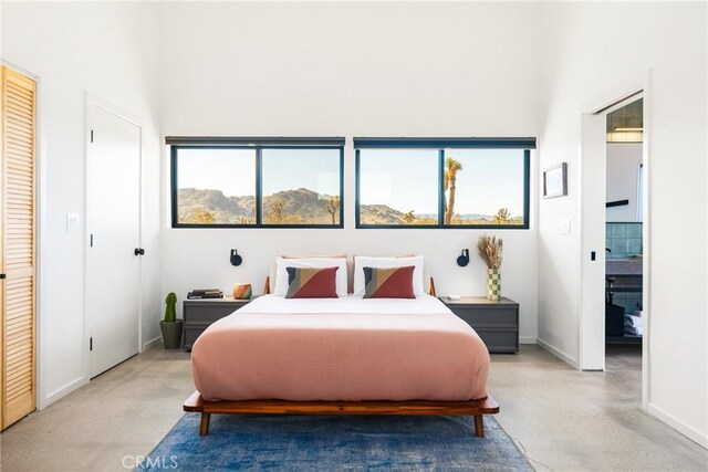 3170 Wesley Rd, Joshua Tree, CA 92252 - bedroom with multiple windows and baseboards