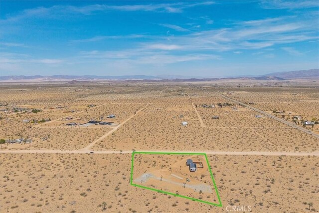 3170 Wesley Rd, Joshua Tree, CA 92252 - view of rural area featuring a desert landscape, a mountainous background, and property parcel outlined