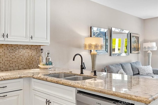 9 Gema, San Clemente, CA 92672 - kitchen featuring a sink, stainless steel dishwasher, backsplash, and white cabinets