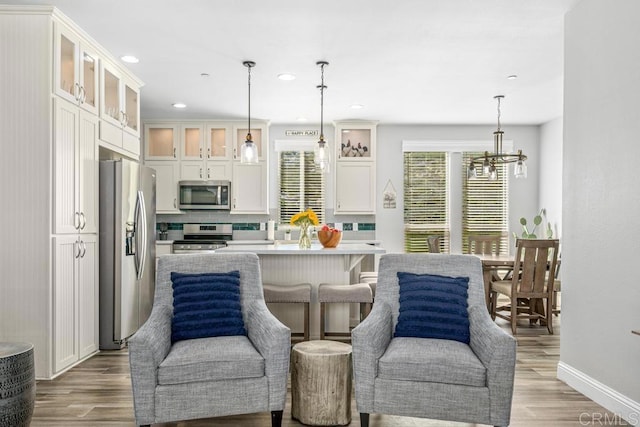 2815 Miller Valley Rd, Pine Valley, CA 91962 - kitchen with stainless steel appliances, light wood finished floors, baseboards, recessed lighting, and white cabinetry