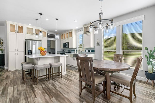 2815 Miller Valley Rd, Pine Valley, CA 91962 - dining area with healthy amount of natural light, a chandelier, recessed lighting, wood finished floors, and baseboards