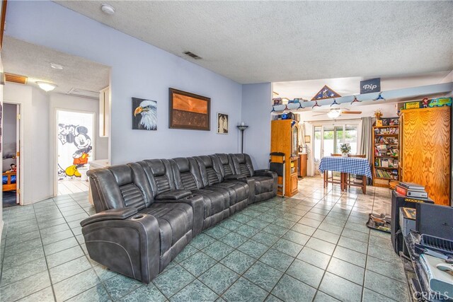 916 Award Dr, Colton, CA 92324 - living room with a textured ceiling and tile patterned floors