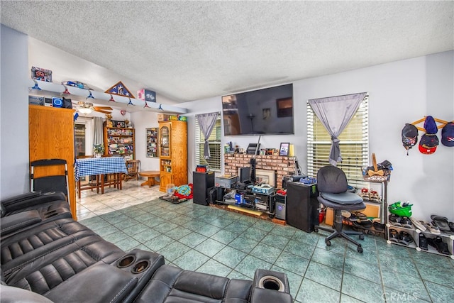 916 Award Dr, Colton, CA 92324 - tiled living area featuring a textured ceiling