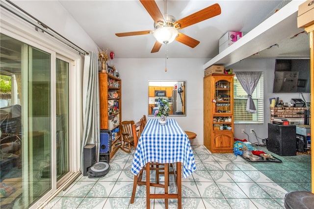 916 Award Dr, Colton, CA 92324 - dining room with ceiling fan and light tile patterned floors