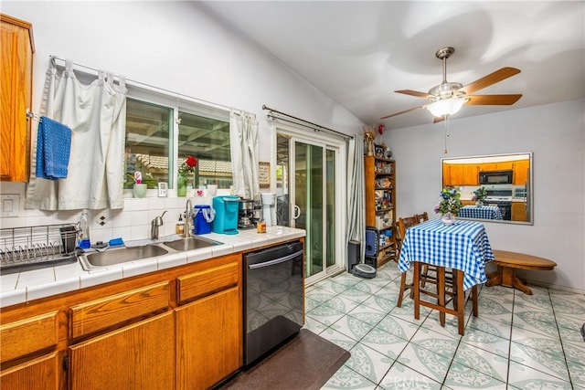 916 Award Dr, Colton, CA 92324 - kitchen with black microwave, dishwasher, a sink, stove, and a ceiling fan