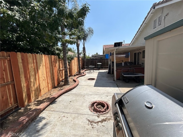 916 Award Dr, Colton, CA 92324 - fenced backyard featuring a patio and grilling area