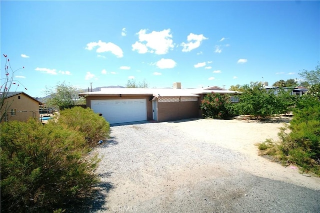 73203 Sun Valley Dr Unit 29, Palms, CA 92277 - single story home featuring a garage, driveway, and stucco siding