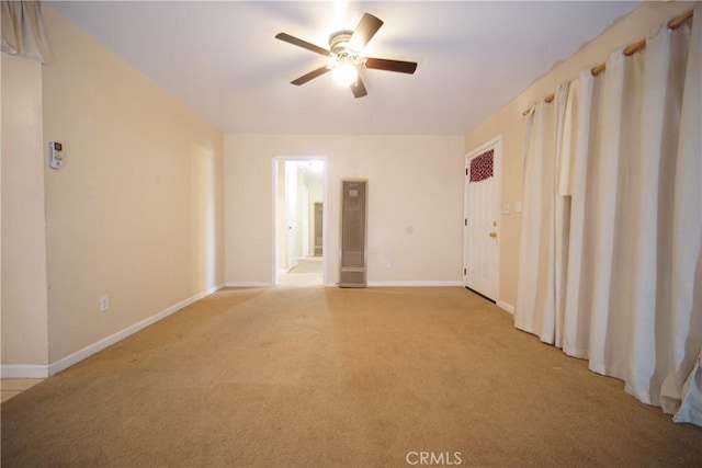 73203 Sun Valley Dr Unit 29, Palms, CA 92277 - unfurnished room with light colored carpet and a ceiling fan