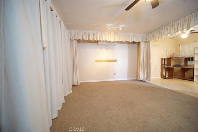 73203 Sun Valley Dr Unit 29, Palms, CA 92277 - carpeted empty room with a ceiling fan and baseboards