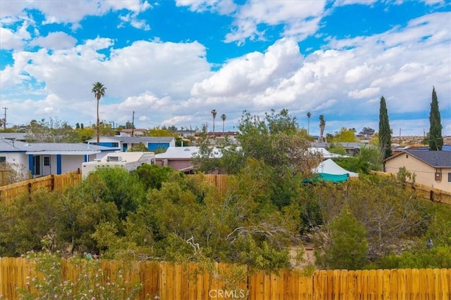 73203 Sun Valley Dr Unit 29, Palms, CA 92277 - water view with a fenced backyard and nearby suburban area