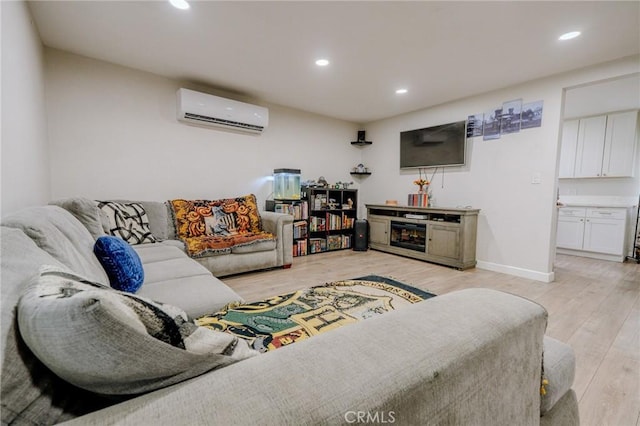 1924 Hunter Rd, Colton, CA 92324 - living room with a wall mounted AC, light wood-type flooring, and recessed lighting