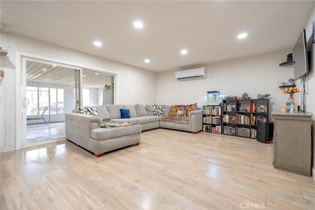 1924 Hunter Rd, Colton, CA 92324 - living area featuring a wall mounted AC, light wood-style floors, and recessed lighting