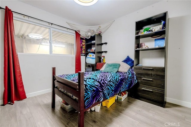 1924 Hunter Rd, Colton, CA 92324 - bedroom with wood finished floors and baseboards