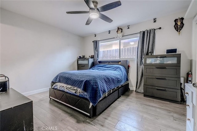 1924 Hunter Rd, Colton, CA 92324 - bedroom with wood finished floors and ceiling fan