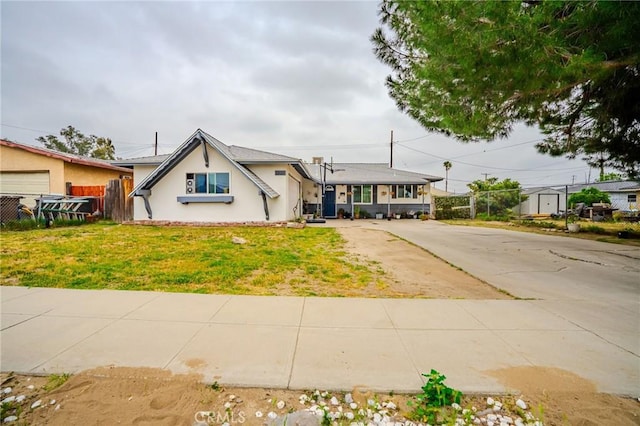 1924 Hunter Rd, Colton, CA 92324 - view of front of property featuring driveway and stucco siding