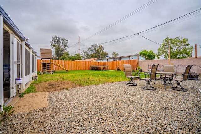 1924 Hunter Rd, Colton, CA 92324 - fenced backyard featuring a playground