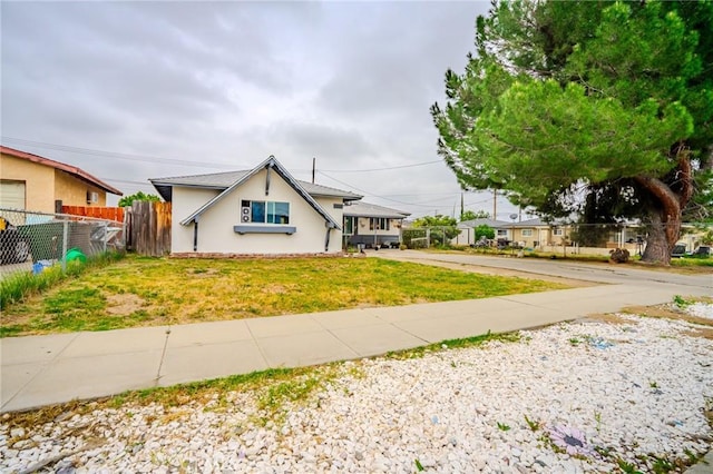 1924 Hunter Rd, Colton, CA 92324 - view of front of property with concrete driveway and stucco siding
