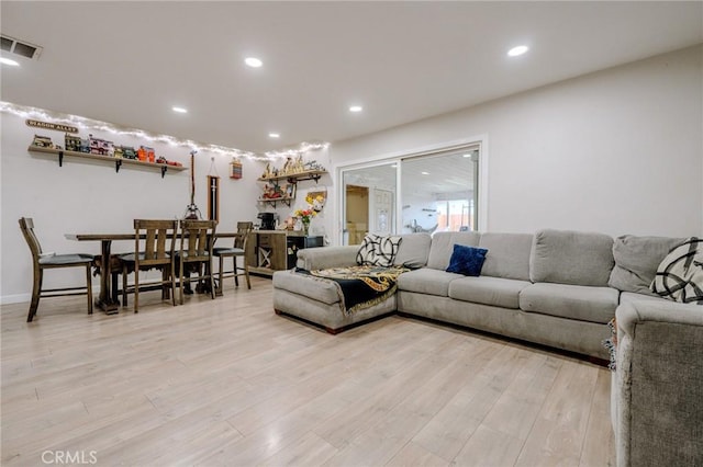 1924 Hunter Rd, Colton, CA 92324 - living room featuring light wood finished floors and recessed lighting