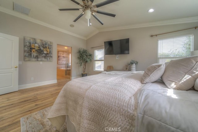 bedroom featuring visible vents, crown molding, light wood-type flooring, baseboards, and lofted ceiling
