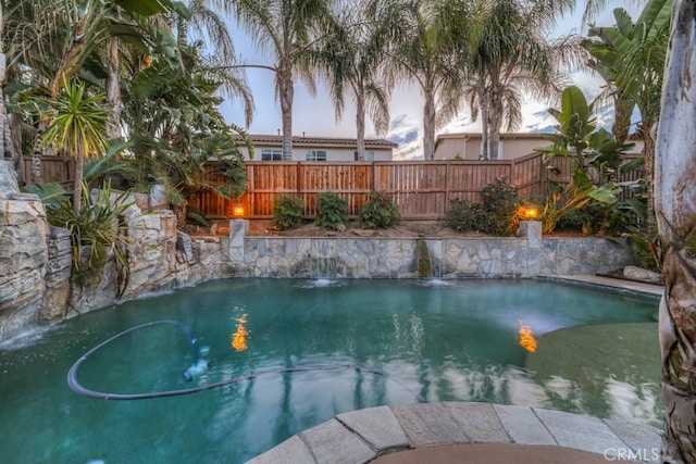 view of pool featuring a fenced in pool and fence