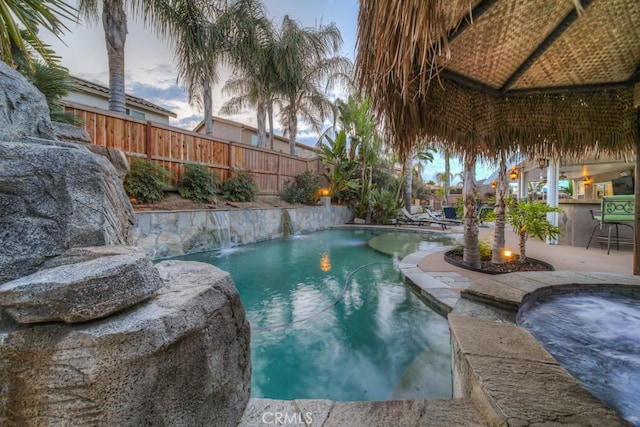 view of swimming pool with a fenced in pool, a patio area, and fence