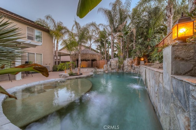 view of pool featuring a fenced in pool, fence, and a patio