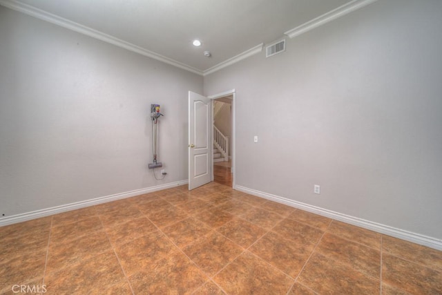 empty room with visible vents, ornamental molding, baseboards, and recessed lighting