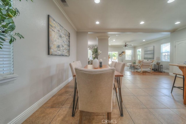 dining area with ceiling fan, recessed lighting, baseboards, light tile patterned floors, and ornamental molding