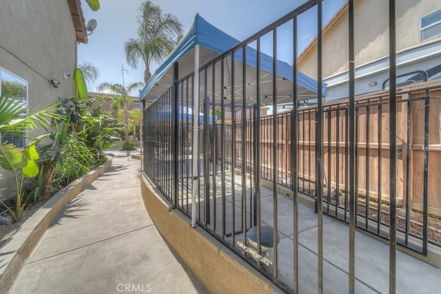 view of gate featuring fence