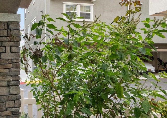exterior space featuring stucco siding