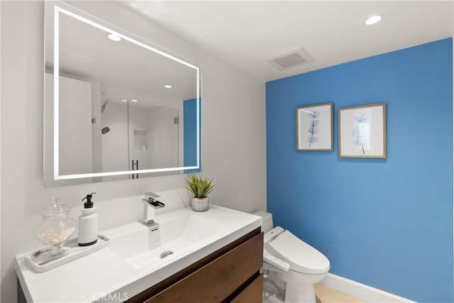 bathroom with recessed lighting, walk in shower, toilet, vanity, and visible vents