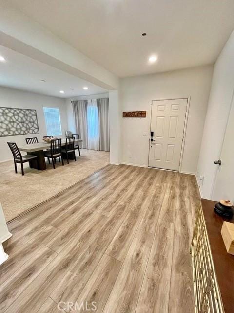2819 La Calle Sabio Ave, Rosamond, CA 93560 - entryway with light wood finished floors and recessed lighting