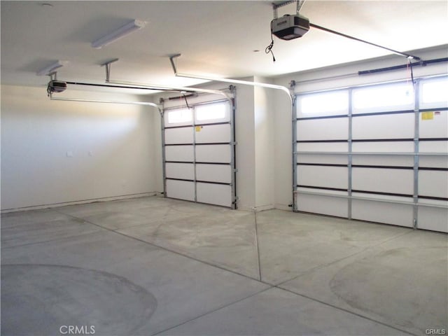 garage featuring a garage door opener