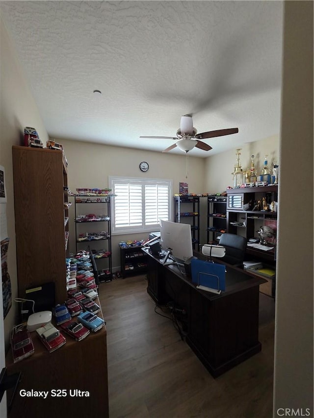 24236 Cahuilla Rd, Apple Valley, CA 92307 - home office with ceiling fan, wood finished floors, and a textured ceiling